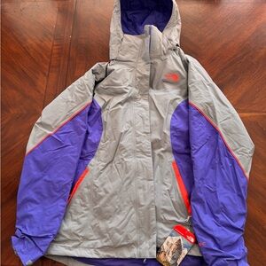The North Face Gray and Blue Jacket with orange Accents